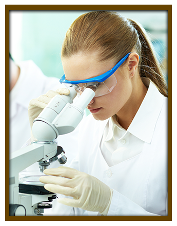 Woman Using A Microscope